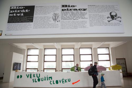 The giant poster is placed on the wall Museo Mundial_CZ_Biopiracy_1
